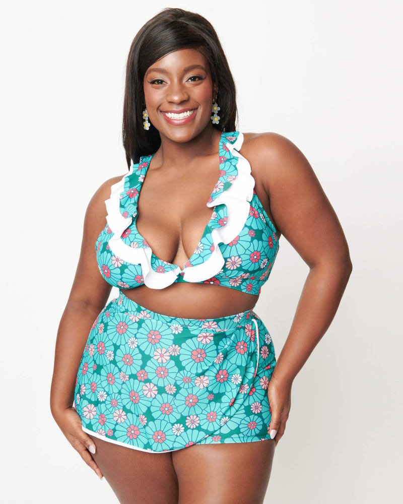 Front of a model wearing a size 3X Unique Vintage Teal Flower Child High Waist Skort Swim Bottom in Teal Flower Child by Unique Vintage. | dia_product_style_image_id:331964
